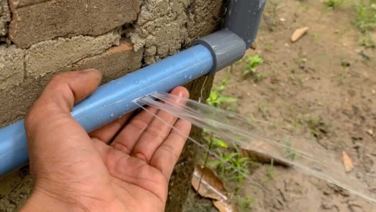 broken PVC pipe leaking water