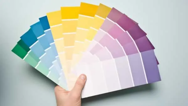 holding color palette in hand