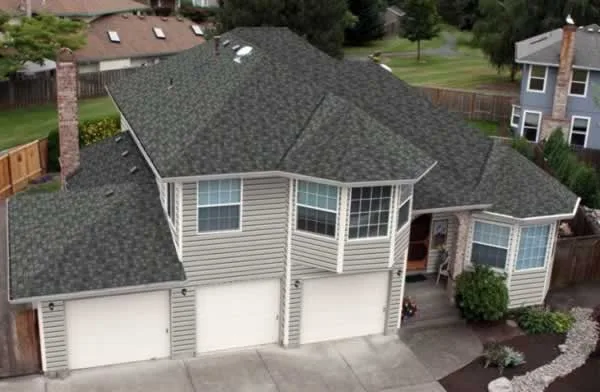 Environmentally Friendly Synthetic Shingles on large family home
