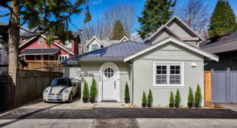 adorable Laneway house with Mini Morris in the driveway