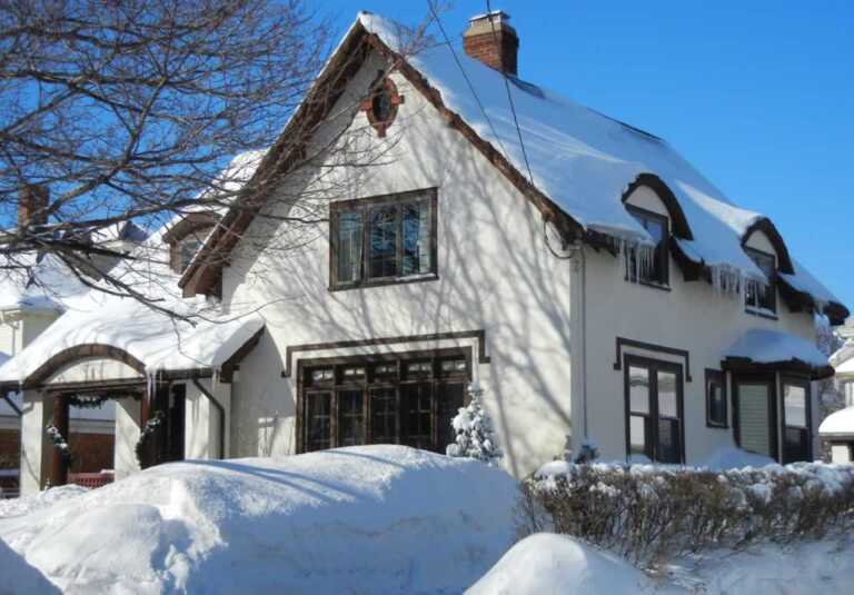 home under the snow in the winter