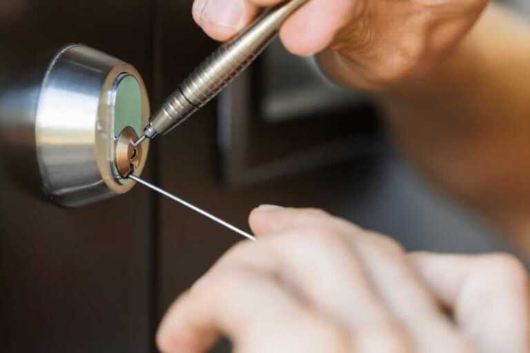 locksmith picking the lock