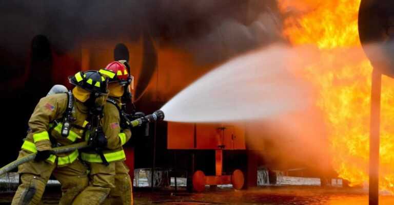 firefighters fighting with fire