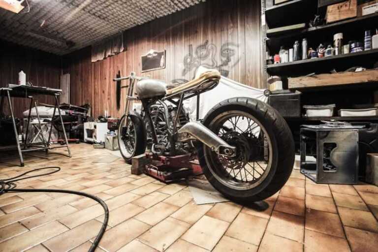 custom chopper project in a man cave garage