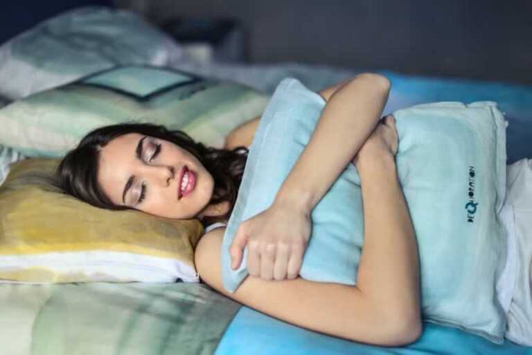 girl sleeping in a cozy bedroom