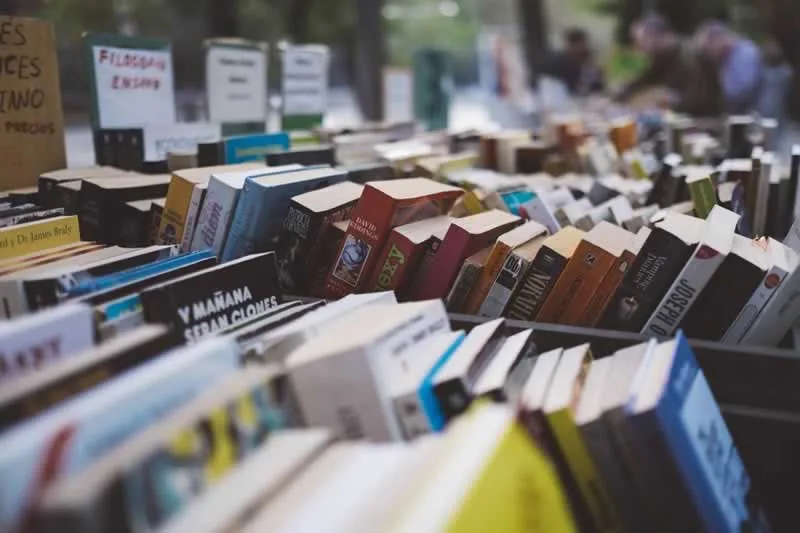various books on shelves in the bookstore