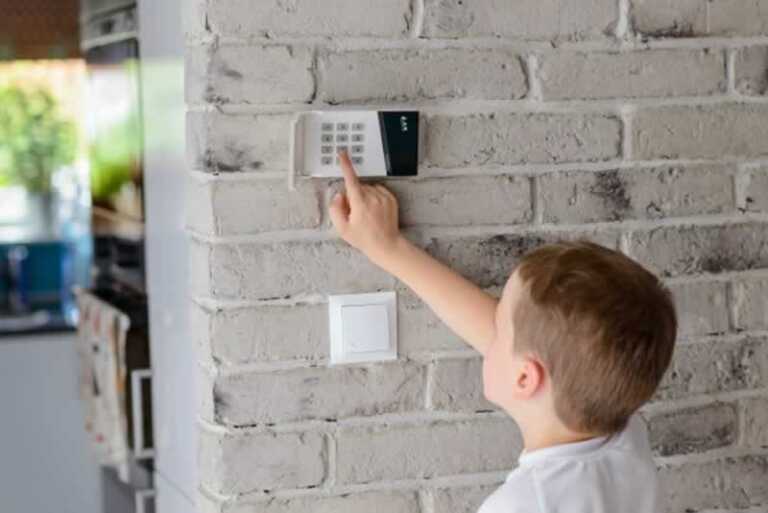 kid unlocking a home security system