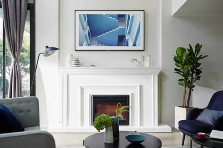 Samsung The Frame TV above the fireplace
