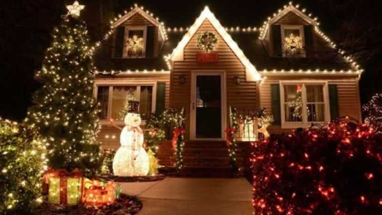 beautiful decor with Christmas lights on the house and in front of the house
