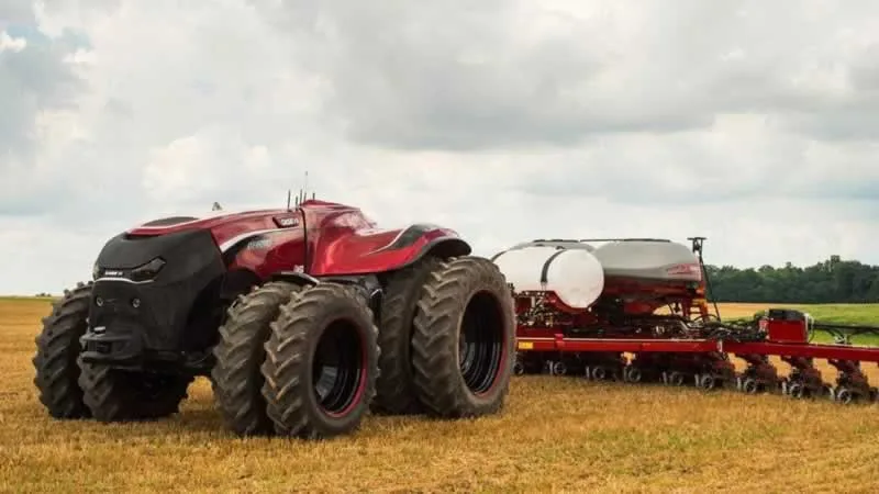 robot tractor tilling the field