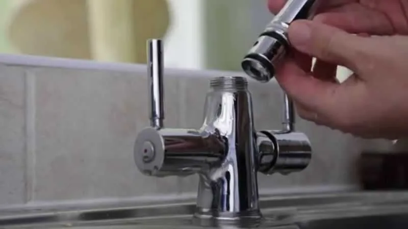 removing the top side of a tap washer