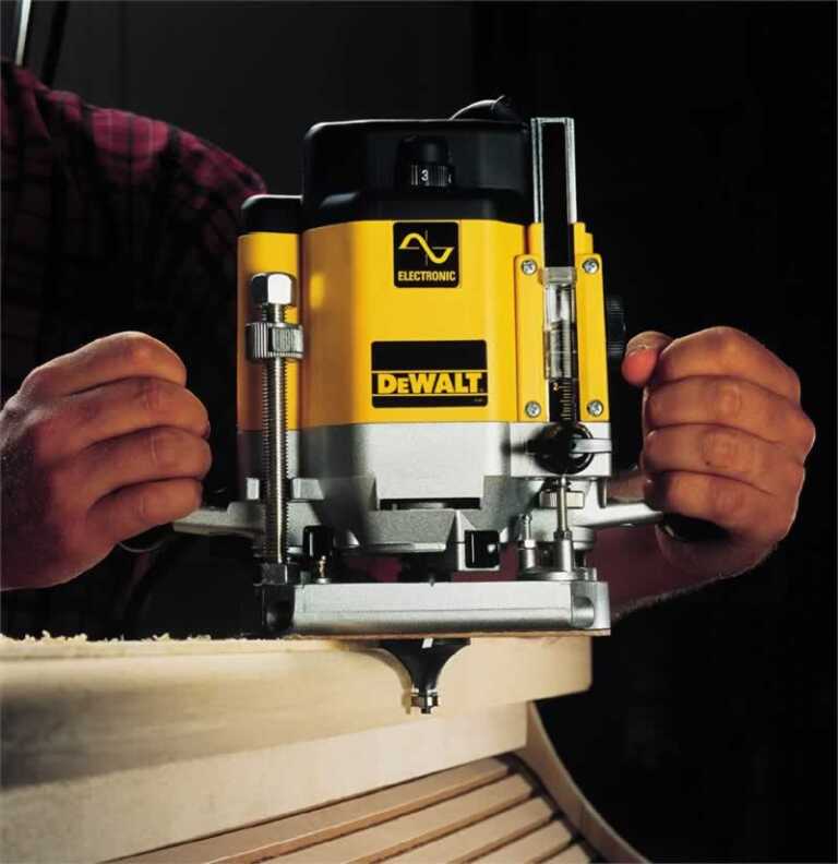 using handheld wood router