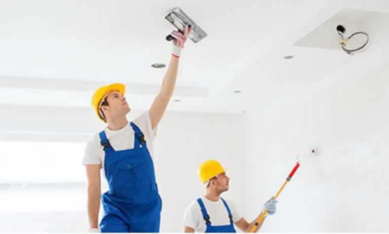 painters painting the house interior