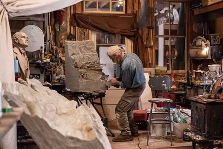 man carving in the workshop