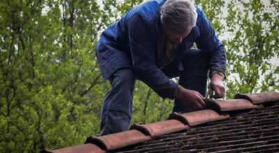 Can I repair or replace my roof myself?