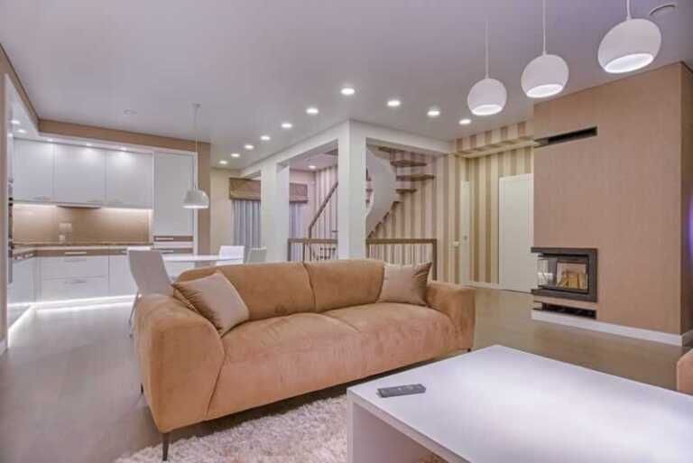 small home with kitchen, dining room and living room in one open space