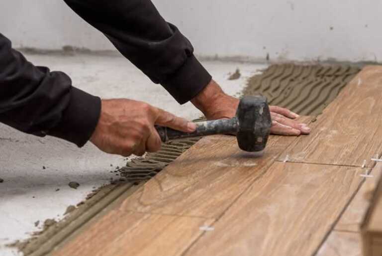 laying new ceramic tiles