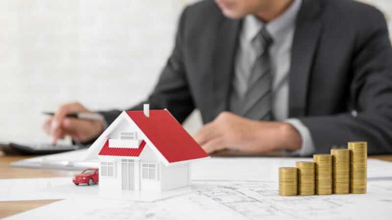 real estate investor calculating the value of property