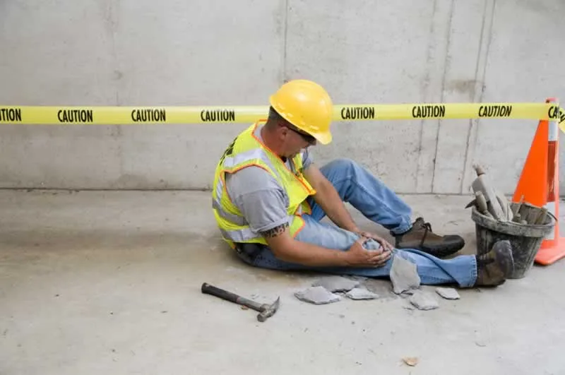 construction worker with injured leg
