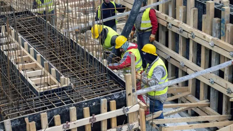 constructing traditional wooden concrete formwork