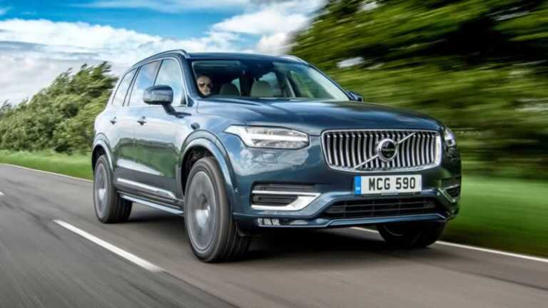 woman driving Volvo XC90