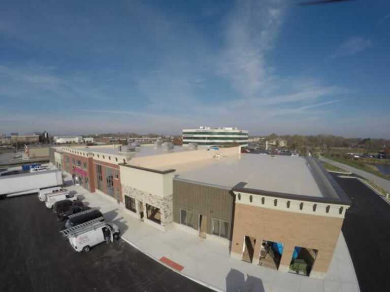 Top 5 Benefits of Flat Roof Installation for Your Business