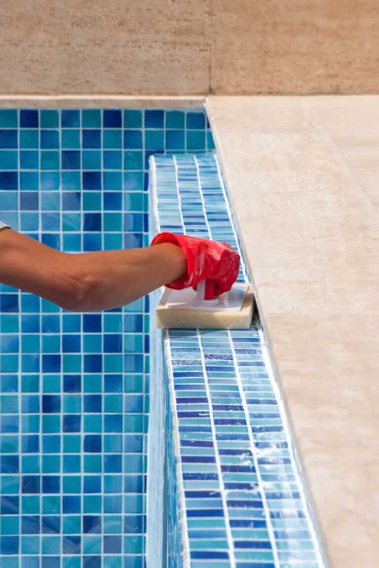 repairing grout on swimming pool