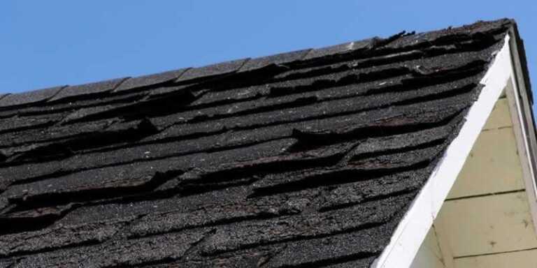 Damaged shingles on roof