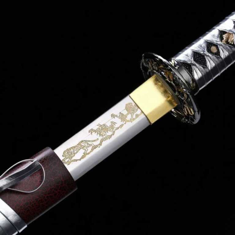 Japanese katana with engraved tiger