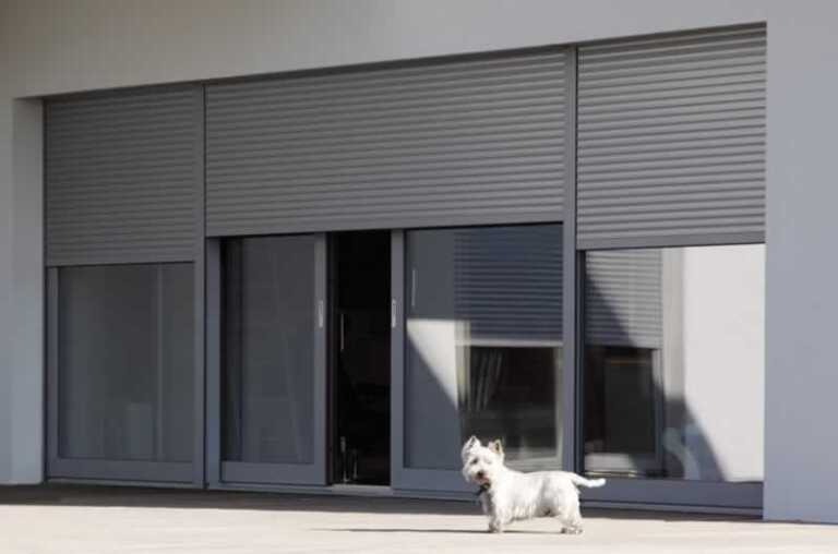 black roller shutters on patio door