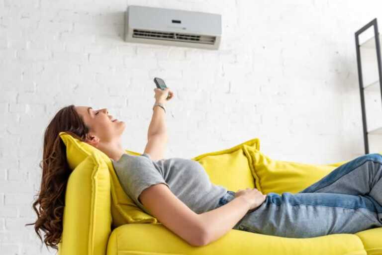 Girl in front of AC