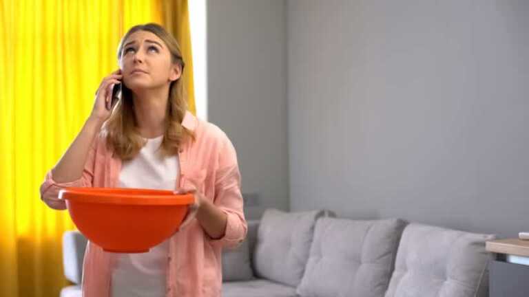 Woman with leaking roof