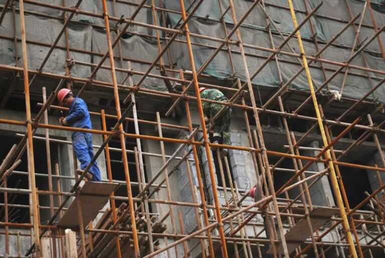 Workers on scaffolding