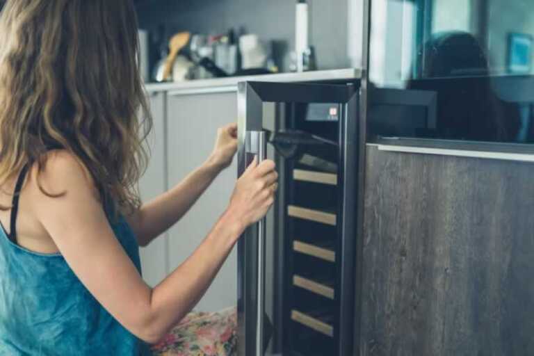 Woman testing wine cooler