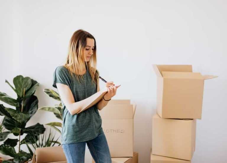Girl making the list of boxes