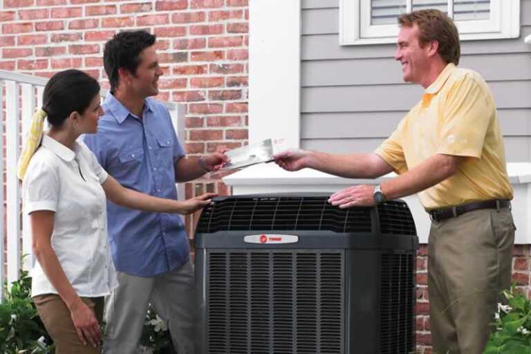 Couple with HVAC technician