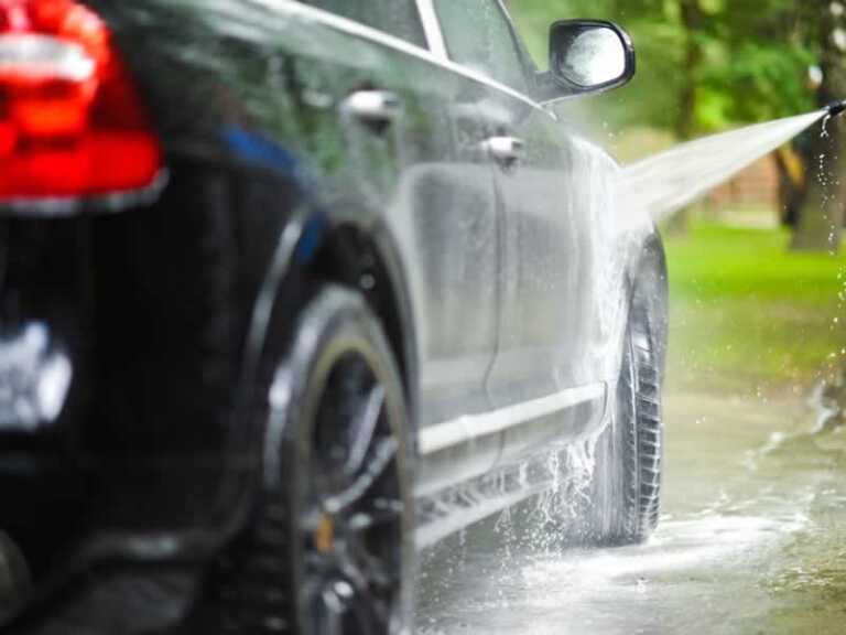 Washing electric car with pressure washer