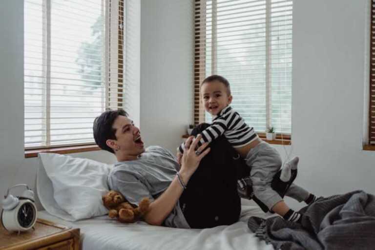man playing with kid