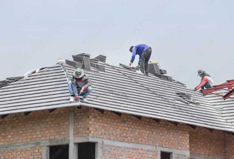 roofers on roof