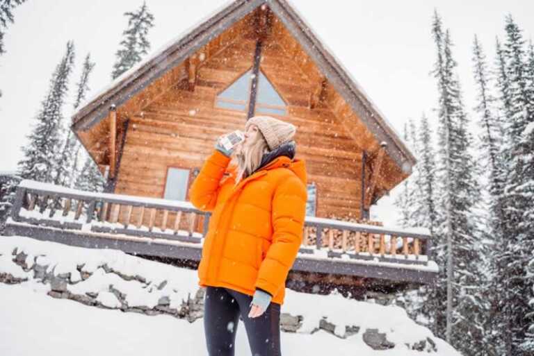 woman drinking in the snow