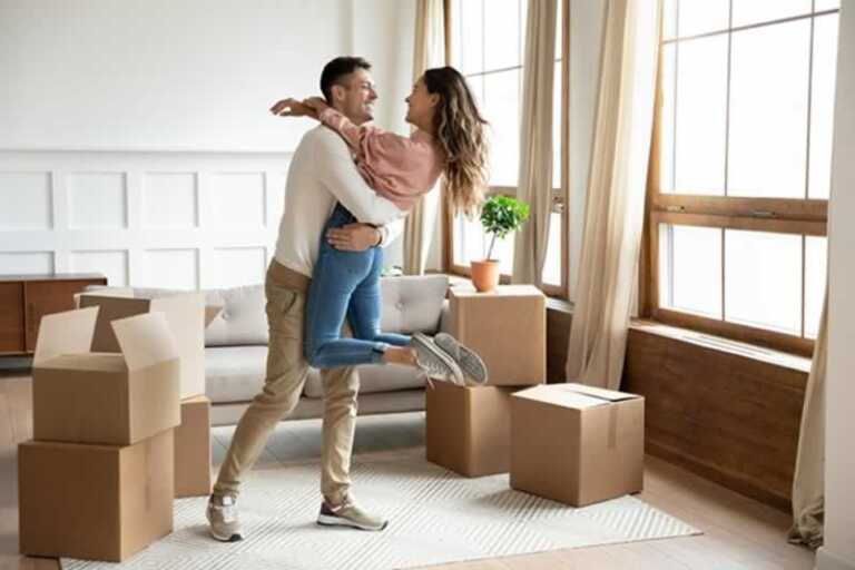 couple hugging in the new home