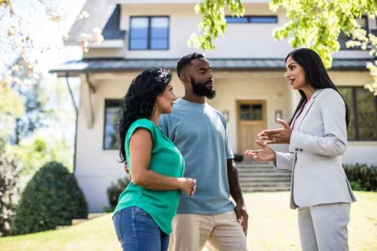 couple with real estate agent