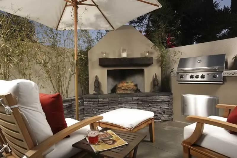 amazing outdoor patio with fireplace and barbecue
