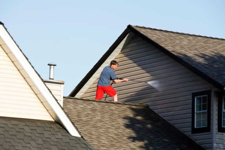 pressure washing a house