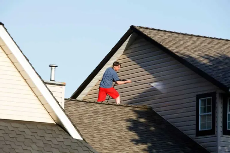 pressure washing a house