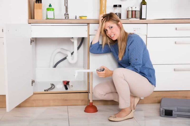 female homeowner with plumbing problem