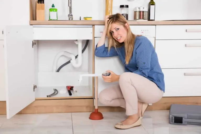 female homeowner with plumbing problem