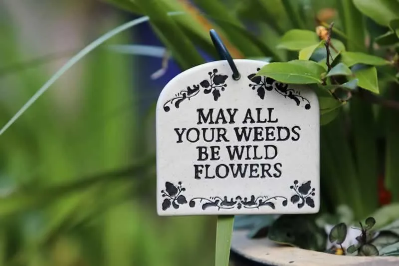 small metal garden sign