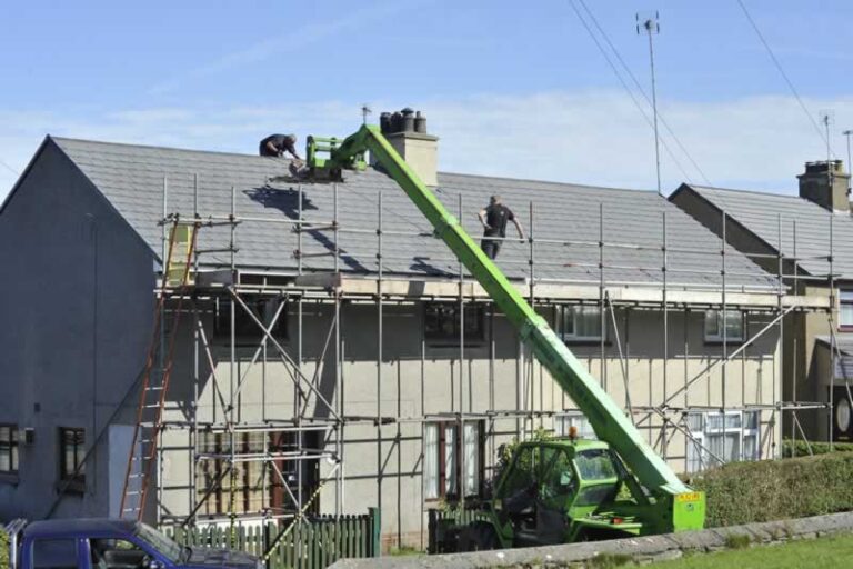 roofers with crane