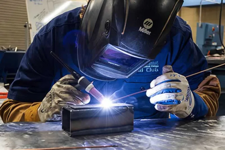 man welding